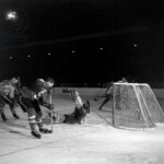6206332 Spengler Cup, 1964 Hc Davos Sparta Prague (b/w photo); (add.info.: The Davos goalie at the tournament for the Spengler Cup in Davos in Bedraengnis, recorded on 28 December 1964 at the game of HC Davos against Sparta Prague. Sparta Prague, dark dress, wins the game with 7:2.); Photopress Archiv/Keystone.